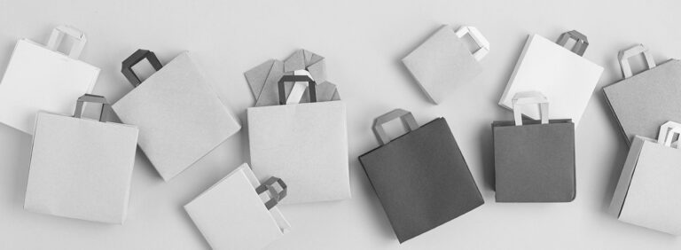 Shopping paper bags. Sesonal sale, online deals, discounts, promotion, shopping addiction concept